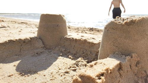 Low section of woman on beach