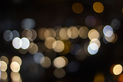 Defocused image of illuminated lights at night