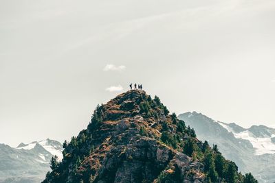 Rock formation on mountain against sky