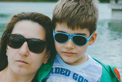 Mother and son wearing sunglasses