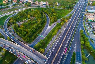 High angle view of vehicles on road in city