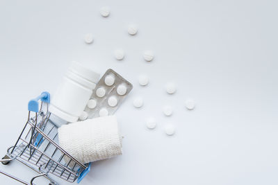 High angle view of medicines on white background