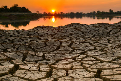 Scenic view of lake during sunset