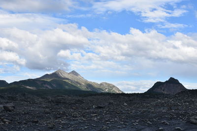 Scenic view of rocky mountains against sky