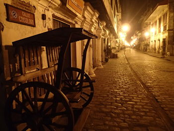 Bicycles on street in city at night