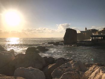 Scenic view of sea against sky during sunset