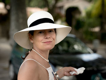 Portrait of woman wearing hat