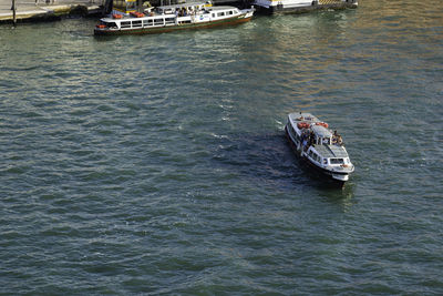 High angle view of boat sailing in sea