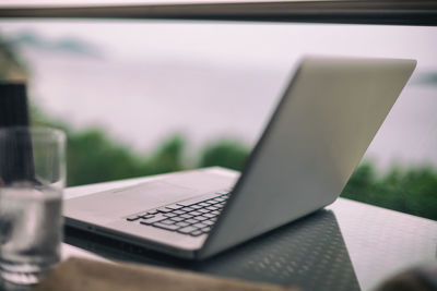 Close-up of laptop on table