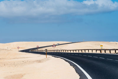 Bridge over sea against sky