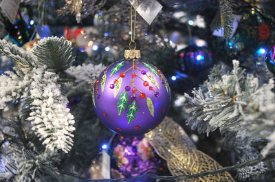 Close-up of christmas decoration hanging on tree