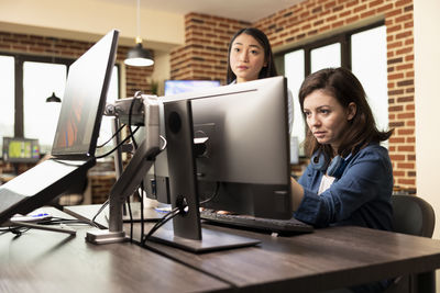 Businesswoman working on table