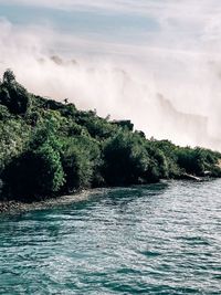 Scenic view of river against sky