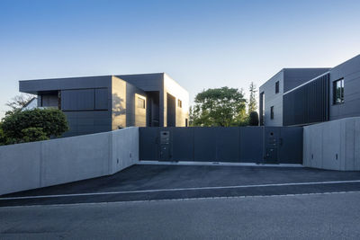 Modern detached house under blue sky