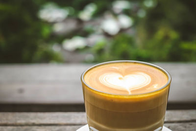 Close-up of coffee cup on table