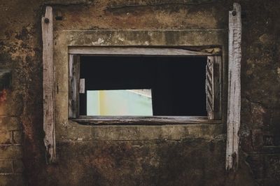 Old window of abandoned building