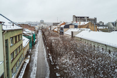 High angle view of street in city against sky