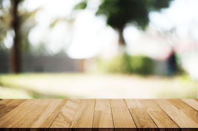 Surface level of wooden table in park