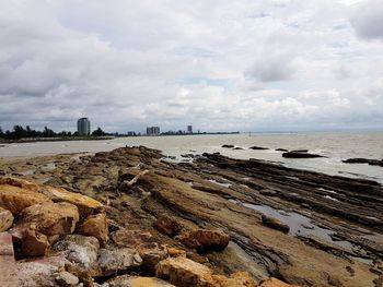 Scenic view of beach against sky