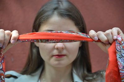 Close-up portrait of a girl wearing mask