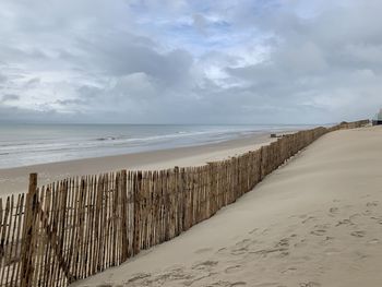 Scenic view of beach against sky