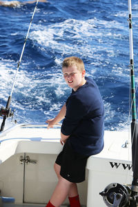 Young boy on a fishing boat 