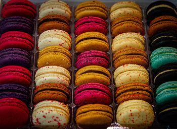 High angle view of multi colored macaroons for sale