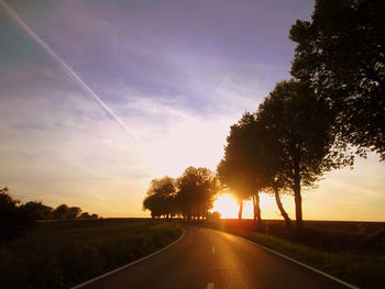 Empty road at sunset