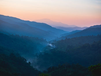 Beautiful nature of hills and mountain are complex with the atmosphere of the morning sunrise.