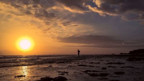 Scenic view of sunset over sea