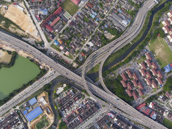 High angle view of road amidst buildings in city