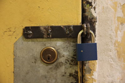 Close-up of padlocks on wall