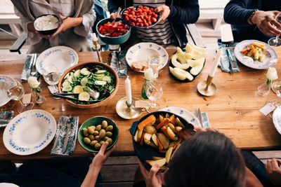 High angle view of people on table