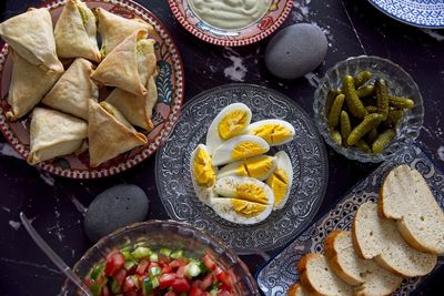 A healthy mediterranean diet. israeli breakfast. vegetable salad, grinding, eggs, pastries, borax