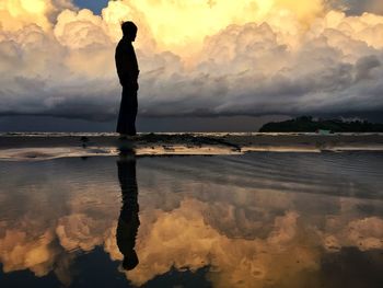 Scenic view of sea against dramatic sky