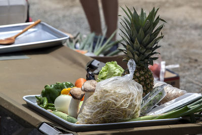 High angle view of vegetables with pineapple on table