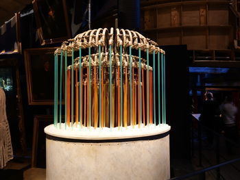Close-up of illuminated candles in temple