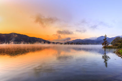 Scenic view of lake against sky during sunrise in nami island
