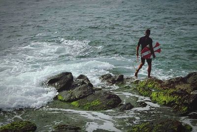 Waves splashing on rocks