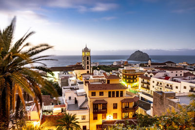 Spain, canary islands, garachico, town on coast oftenerifeisland at sunset