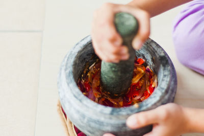 Close-up of person preparing food