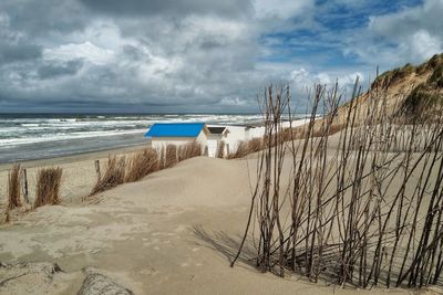 Scenic view of beach against sky