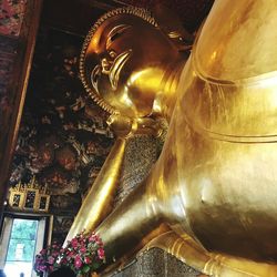 Low angle view of buddha statue