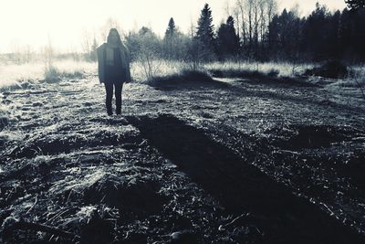 Woman standing in water