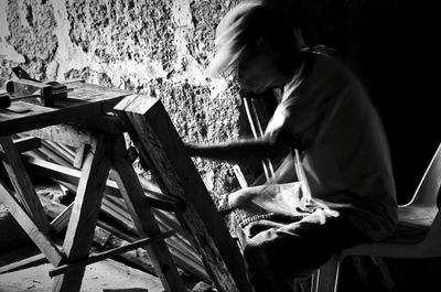 Woman sitting on ground