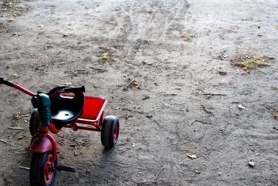 Close-up of red car parked