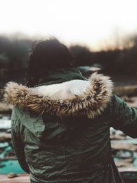 Rear view of woman wearing warm clothing during winter