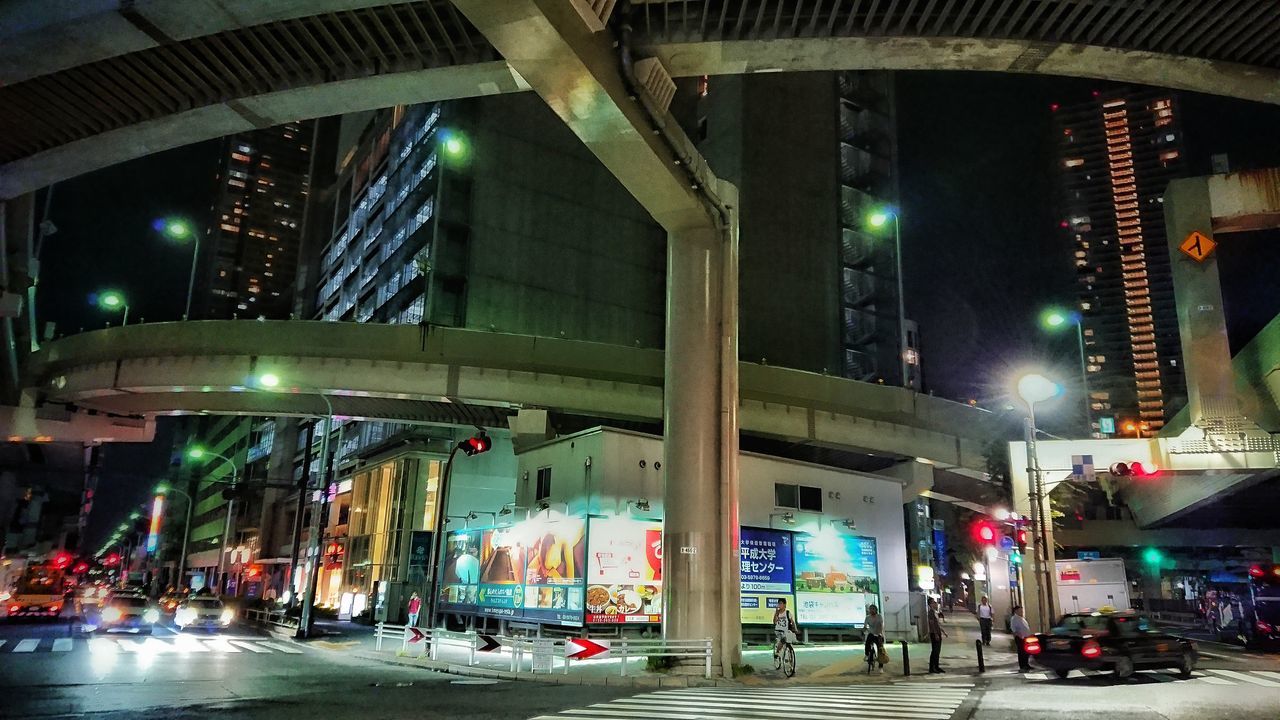 architecture, built structure, transportation, bridge - man made structure, building exterior, city, car, land vehicle, illuminated, road, street, connection, mode of transport, night, outdoors, modern, no people, sky