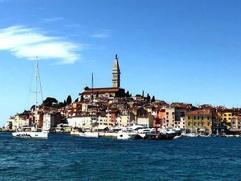 Sailboats in river by buildings in city against sky. beautiful  holiday destination in croatia. 