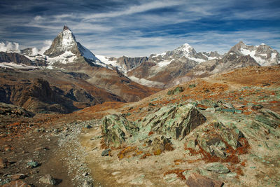 Scenic view of snowcapped mountains against sky